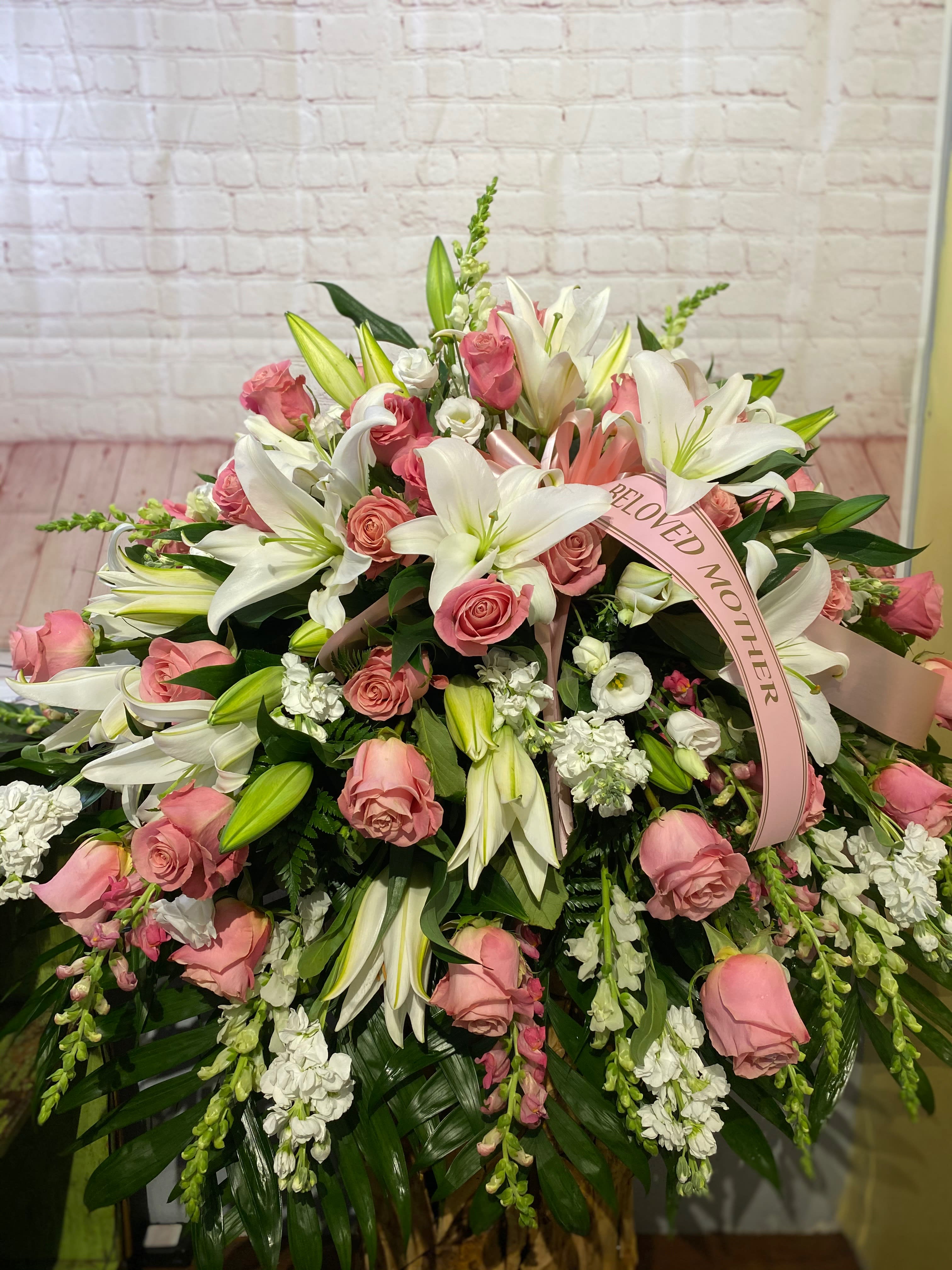 Large pink and white floral spray with lilies and roses