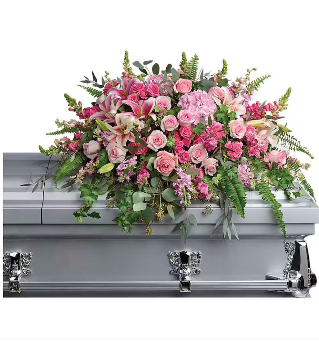 Pink floral spray on a silver casket