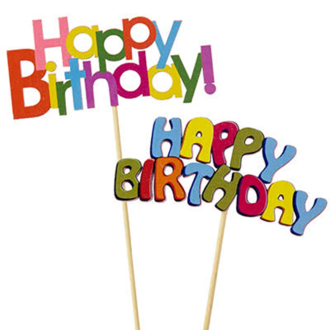 Colorful Happy Birthday cake toppers on wooden sticks