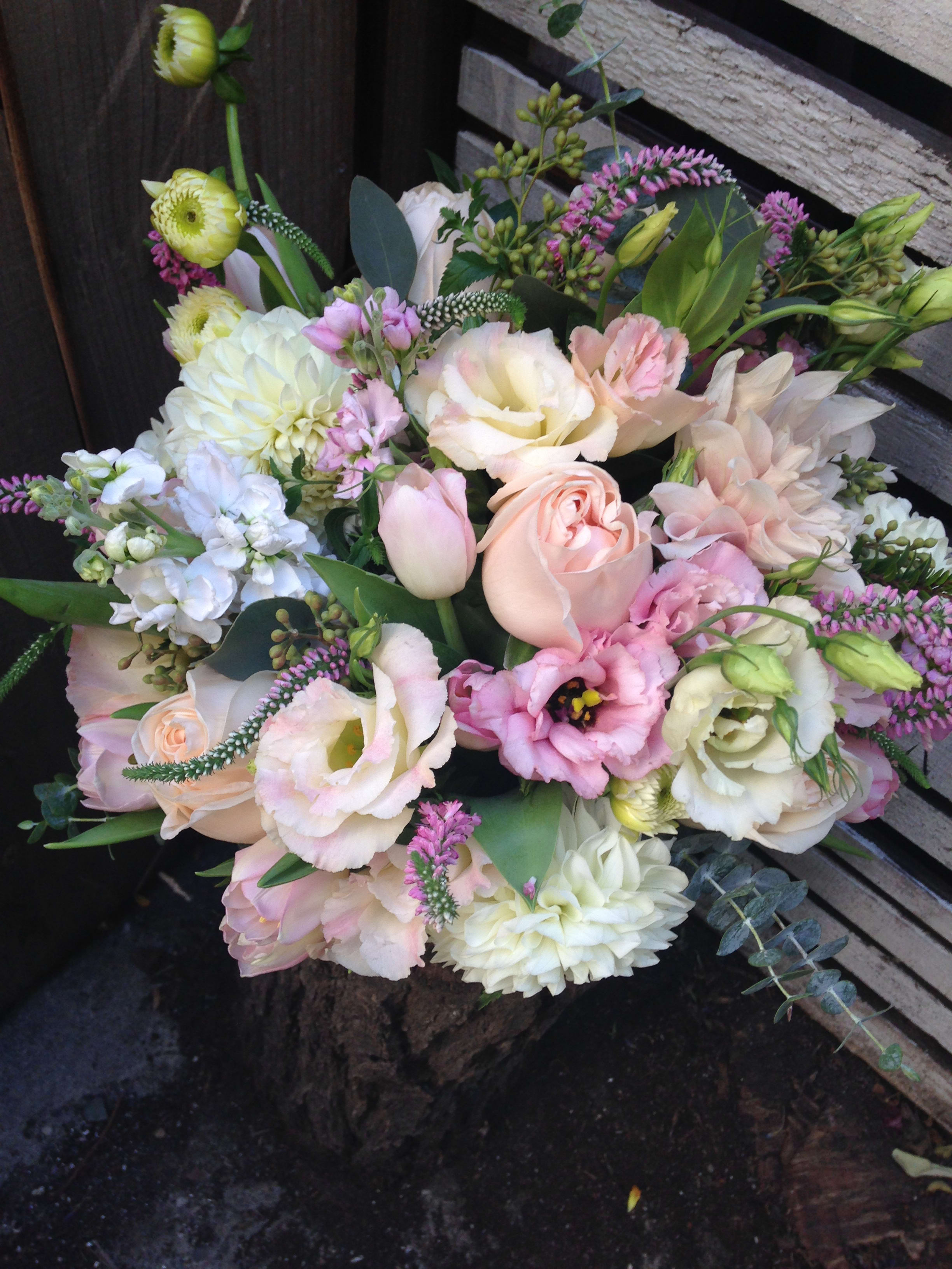 Pastel bouquet of roses, lisianthus, and chrysanthemums
