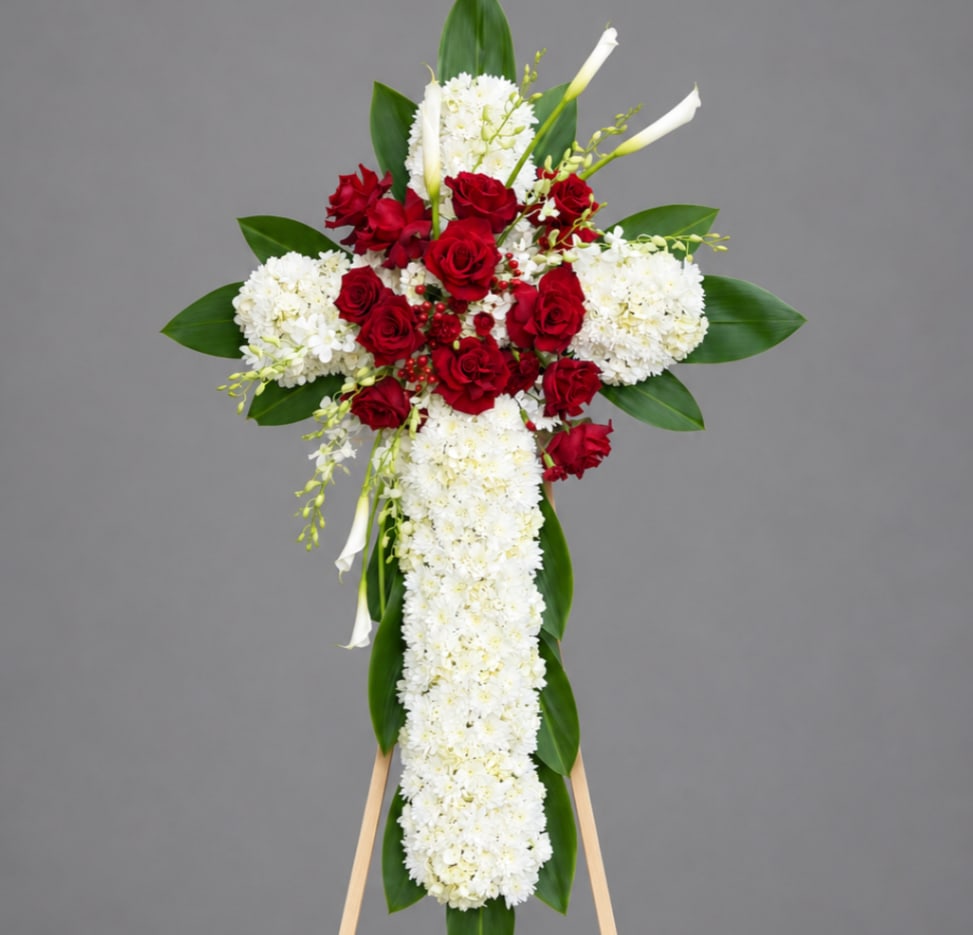Standing floral cross with red roses and white flowers