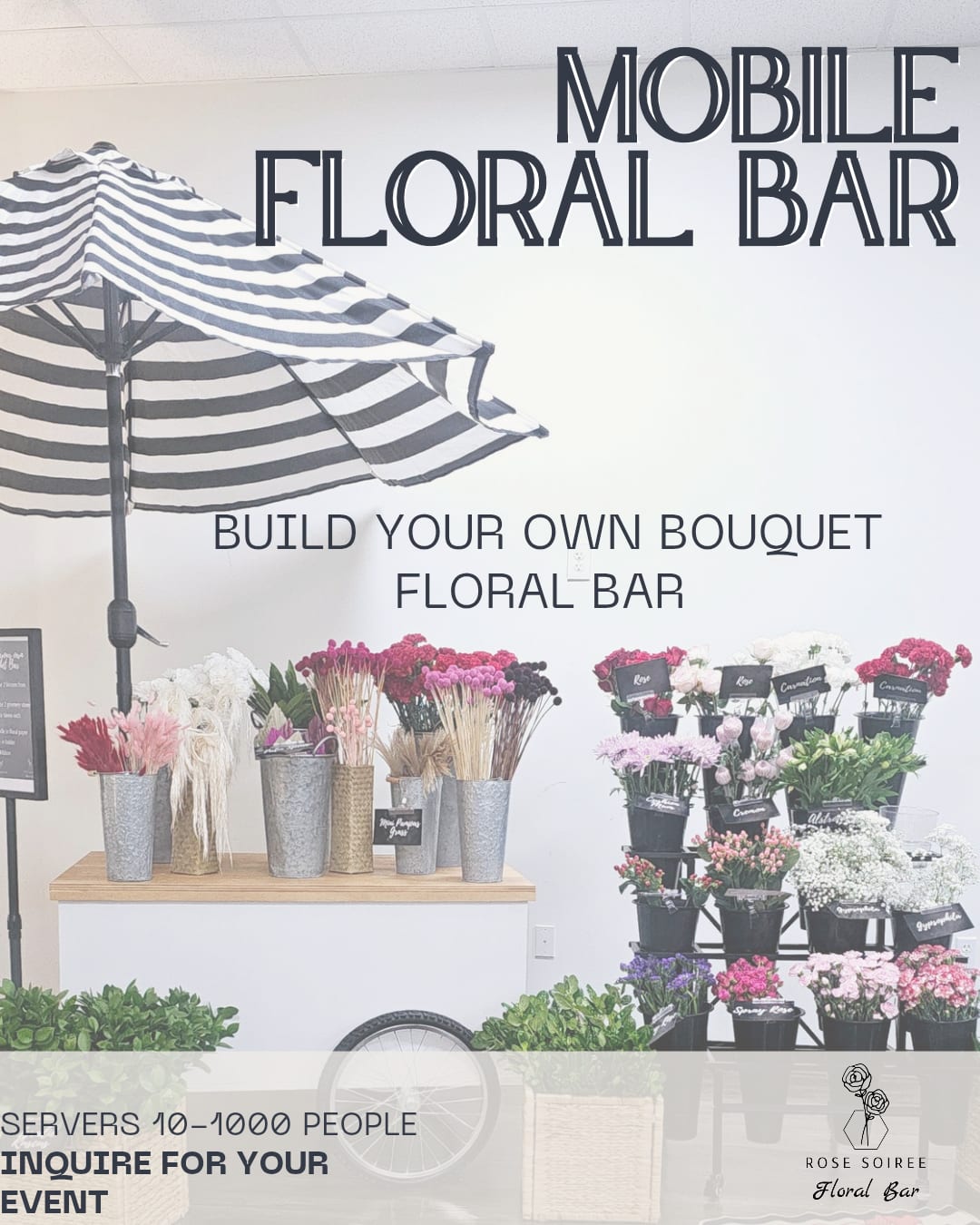 Mobile floral bar display with assorted flowers in buckets under a striped umbrella