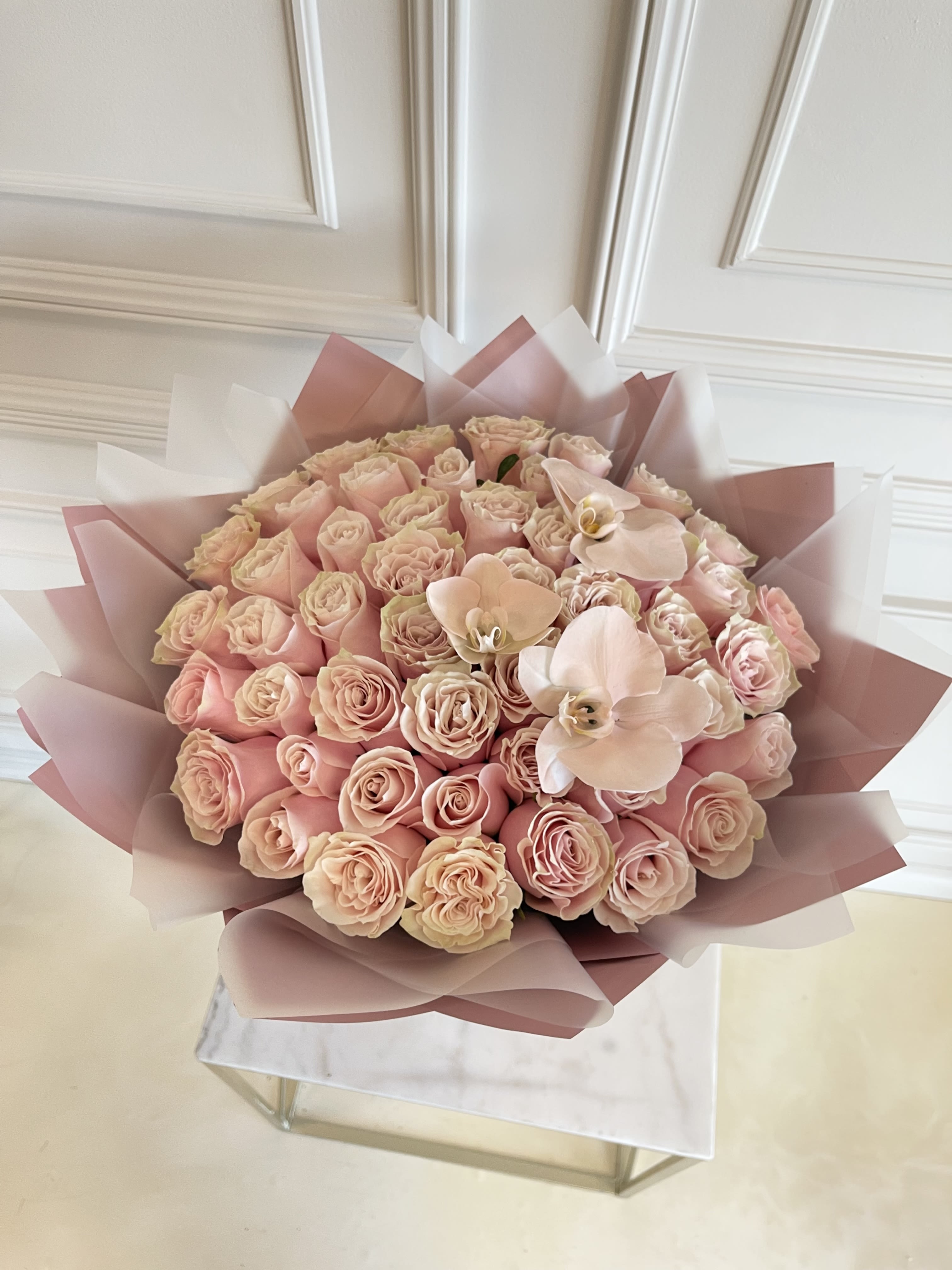 MFS 50 Pink Rose Bouquet (Orchids)  - Signature hand-tied rose bouquet  50 Pink Roses  Orchids   *This bouquet does not include a glass vase 