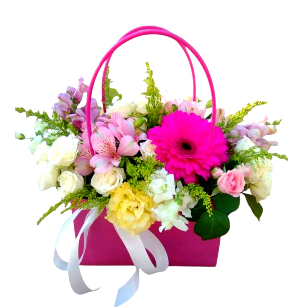 Pink basket arrangement with mixed flowers and a ribbon bow