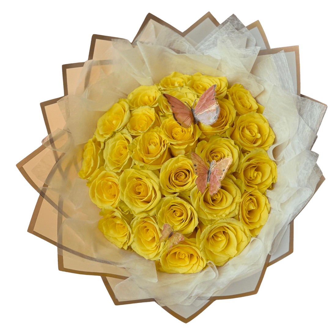 Bouquet of yellow roses wrapped in pale paper with butterfly accents