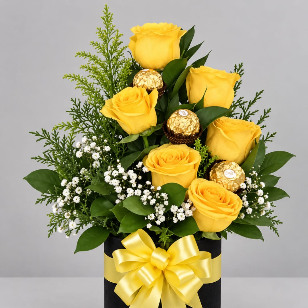 Yellow roses in a black gift box with a yellow ribbon and chocolates