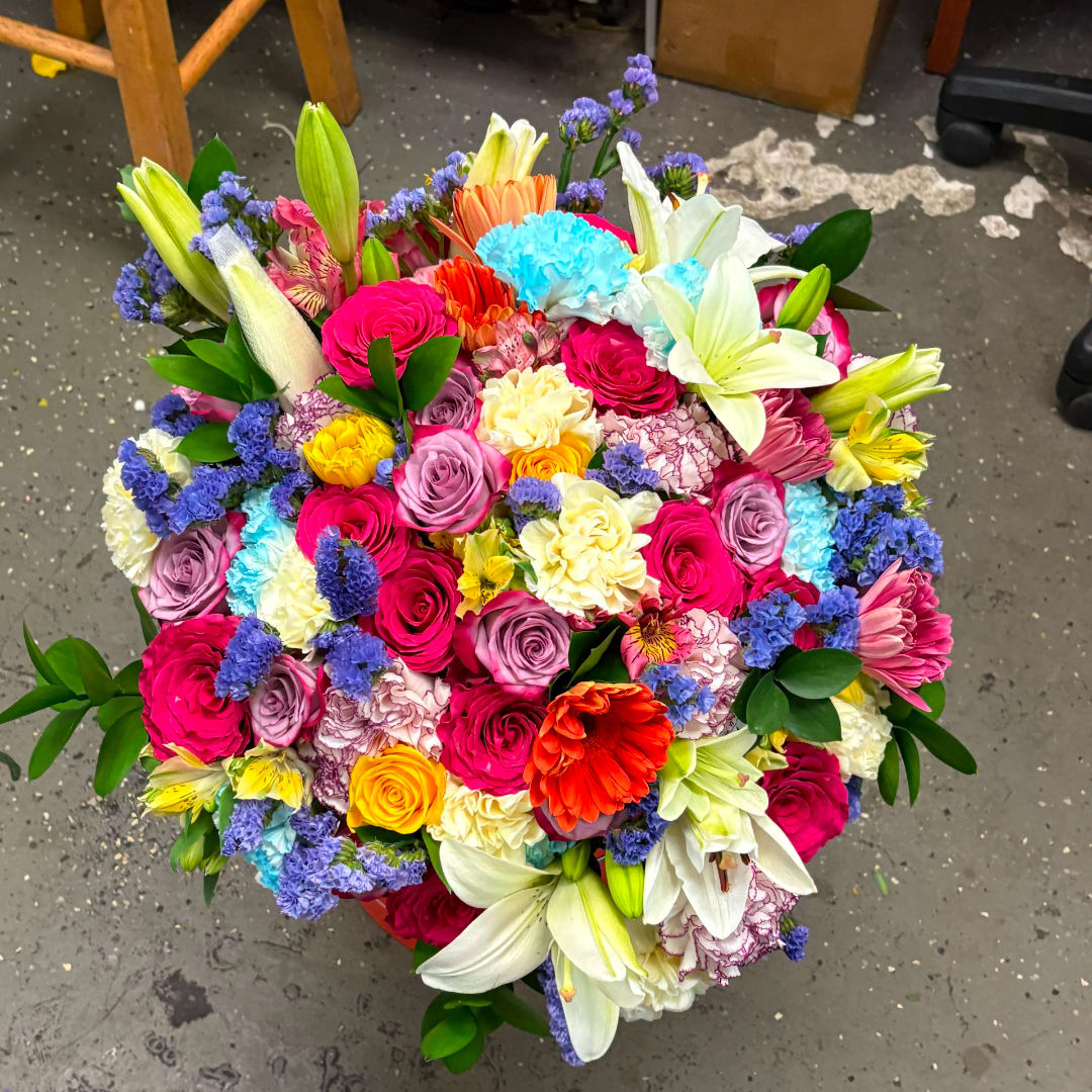 Colorful bouquet with roses, lilies, and carnations