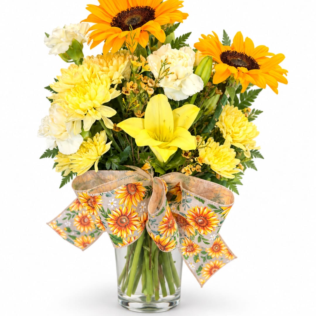 Yellow and white flower bouquet in a glass vase with a sunflower ribbon