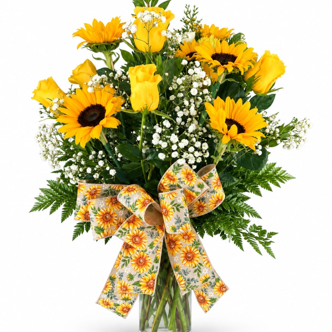 Sunflower and yellow rose bouquet in a glass vase with a sunflower ribbon