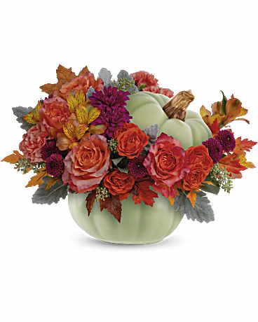 Sage Harvest Bouquet  - Bring autumn's charm to your table with the Sage Harvest Bouquet, a delightful centerpiece adorned with rustic elegance. Nestled in a timeless hand-painted ceramic pumpkin, its exquisite details and warm, earthy hues create a captivating focal point.