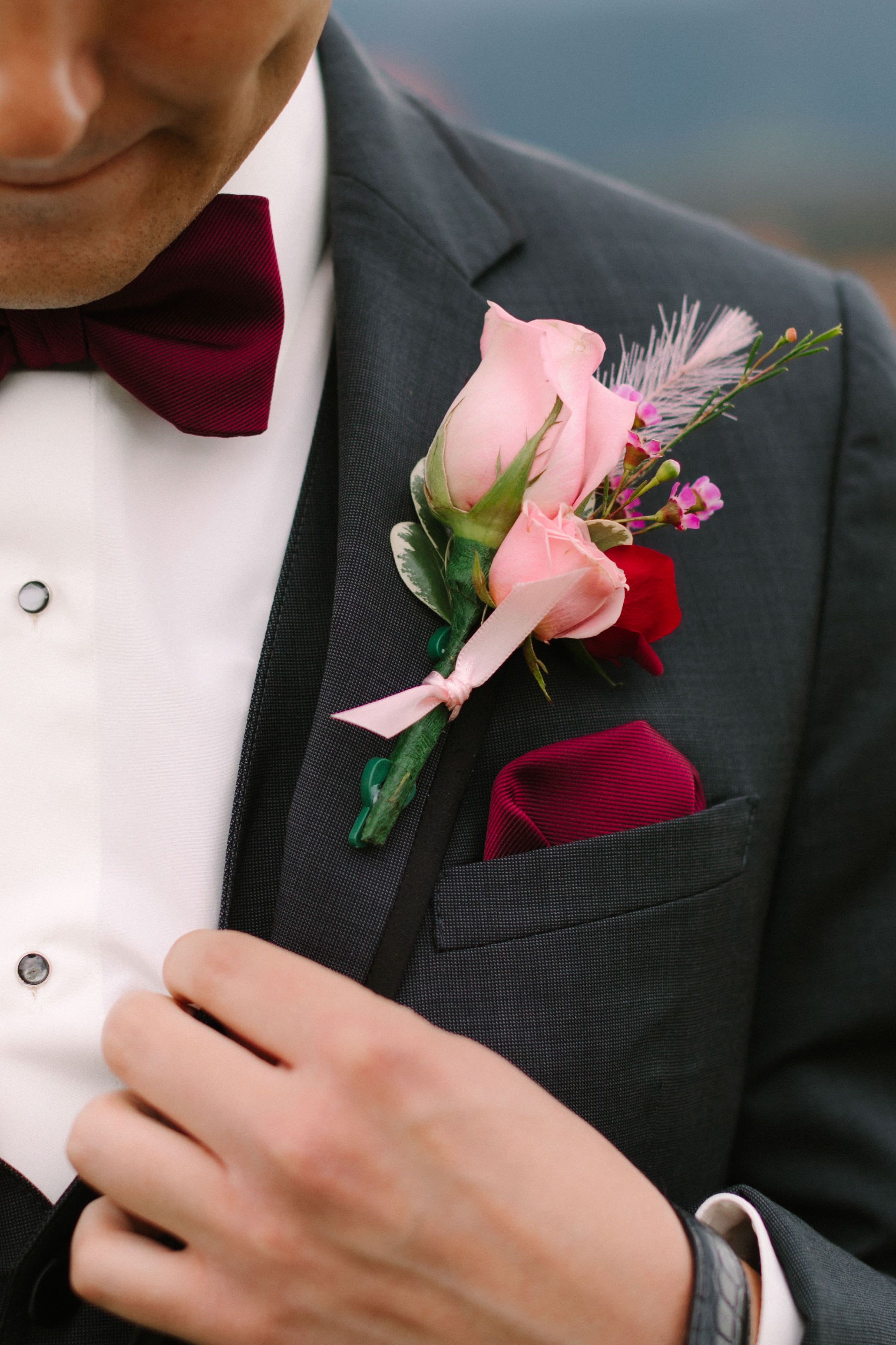 Traditional boutonniere - Traditional boutonniere, in your choice of color, normally these are made with a white rose, a touch of greenery, and your choice of ribbon color. Please let me know what color you need in the special instructions 