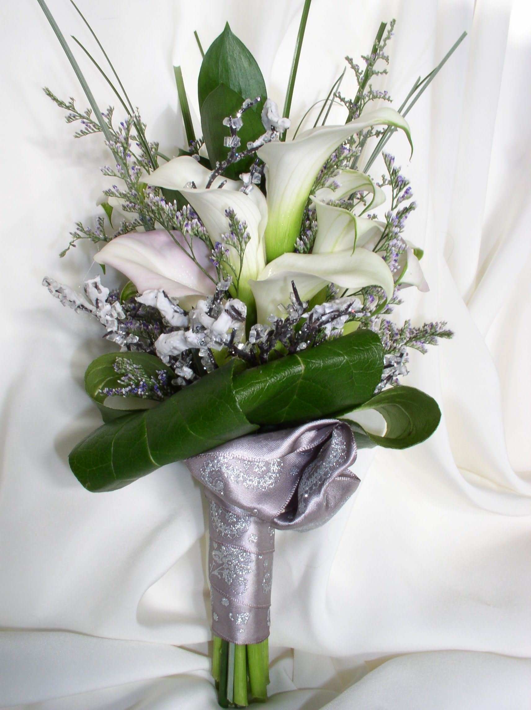 White calla lily bouquet with silver ribbon wrap