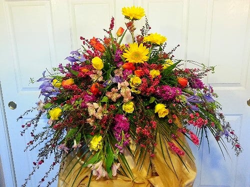 Large mixed bouquet with yellow daisies and colorful flowers