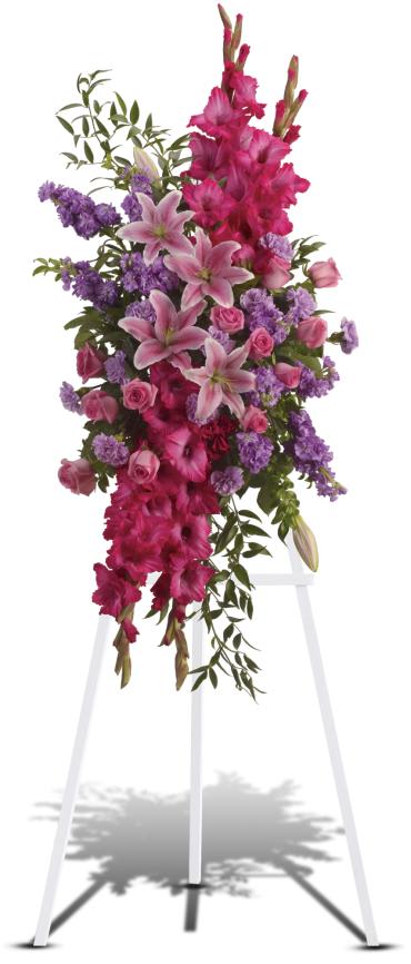 Tall standing floral spray with pink lilies, roses, and purple flowers
