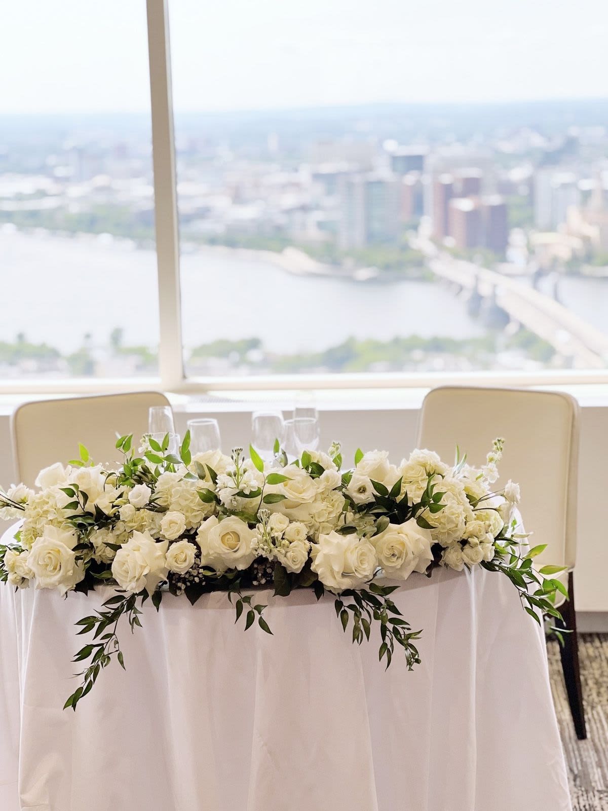 Simple Sweetheart table arrangement  - Simple but elegant sweetheart table decor. Color can be adjusted to your color scheme!