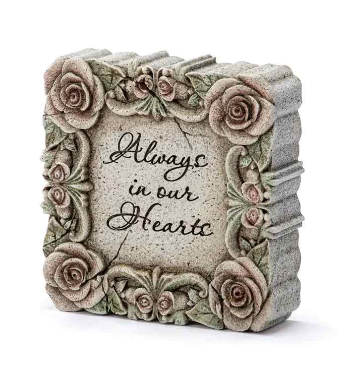 Decorative stone plaque with roses and the words "Always in our Hearts"