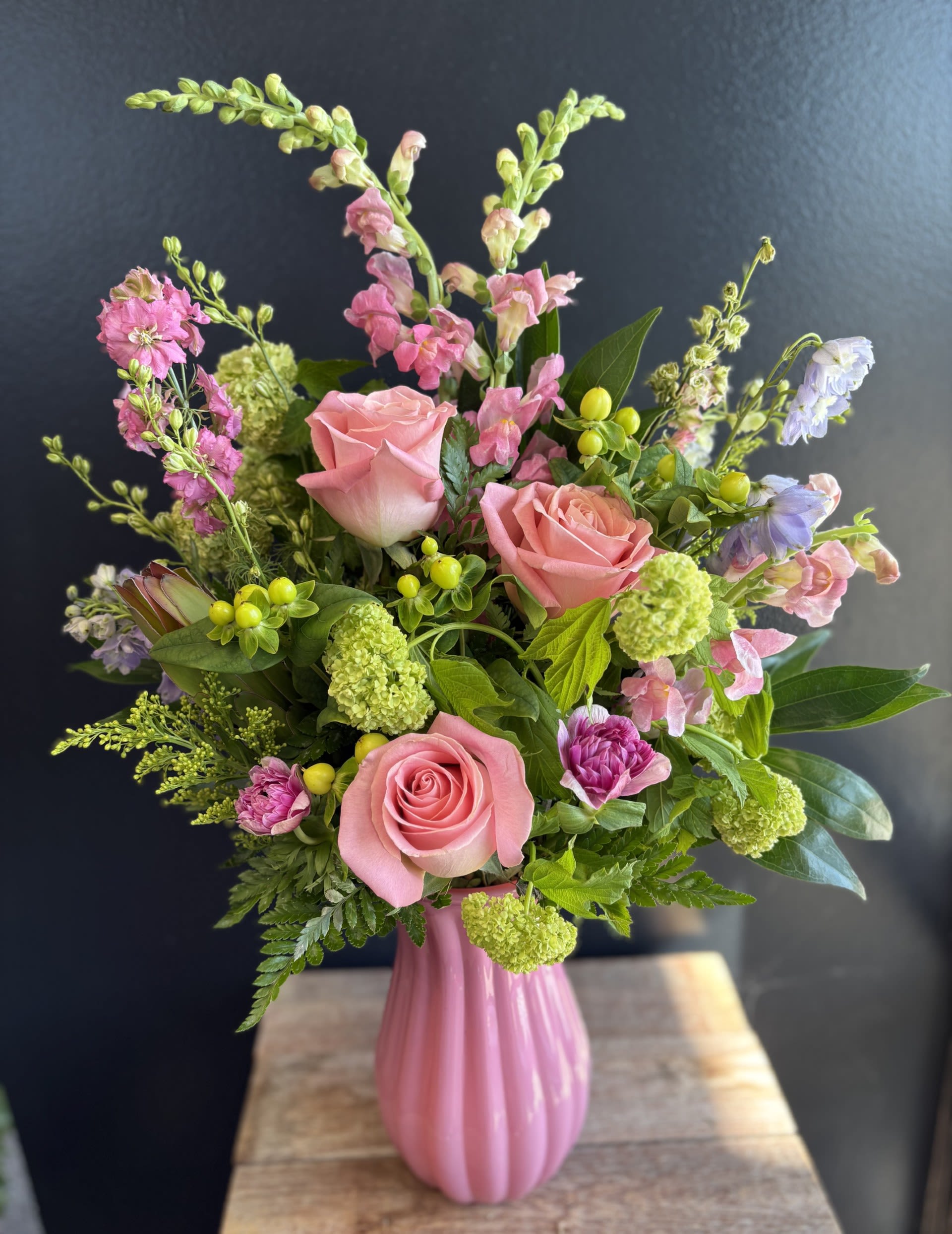 Blooming Bliss  -  Blooms and bliss this floral arrangement is all about softness, lightness, and a dreamy spring feel. May come in pink or purples.