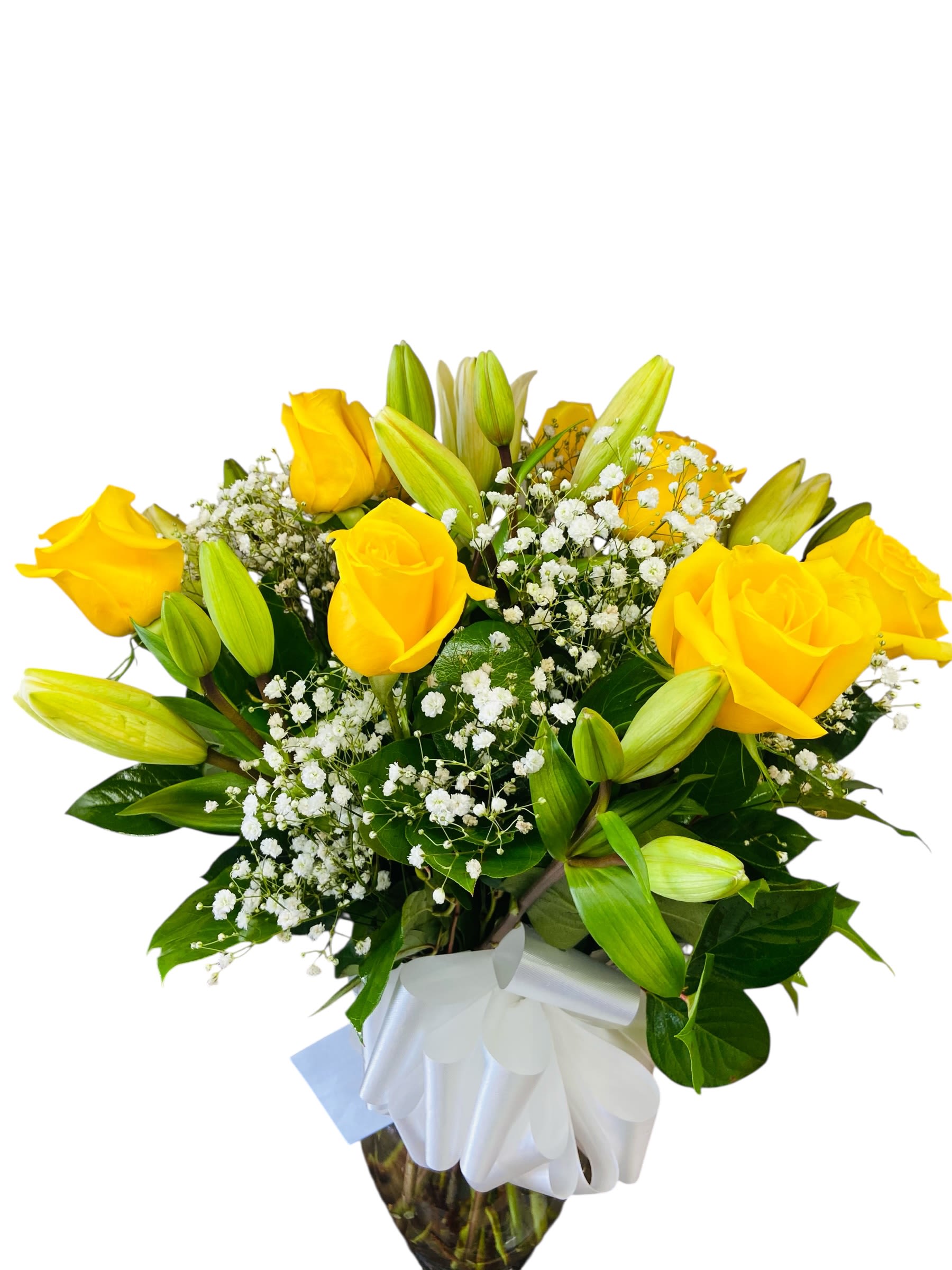 Yellow roses and lilies in a wrapped bouquet with baby's breath
