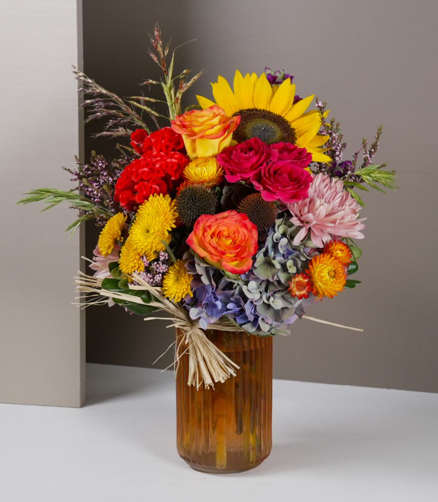 "Oklahoma!" - Golden yellows and rustic charm - wide open spaces captured in a cheerful bouquet.