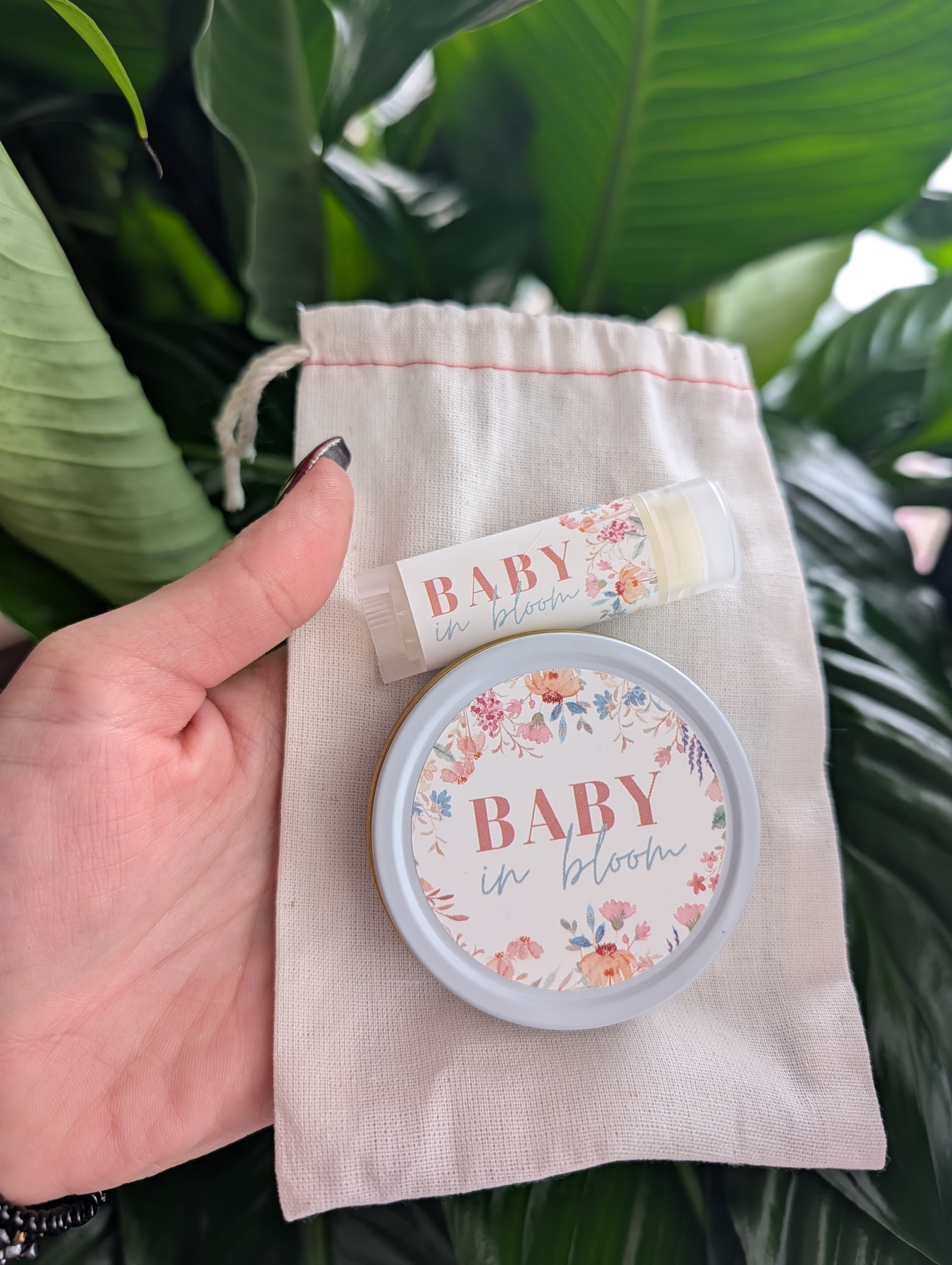 Baby in bloom lip balm and tin in a small drawstring pouch