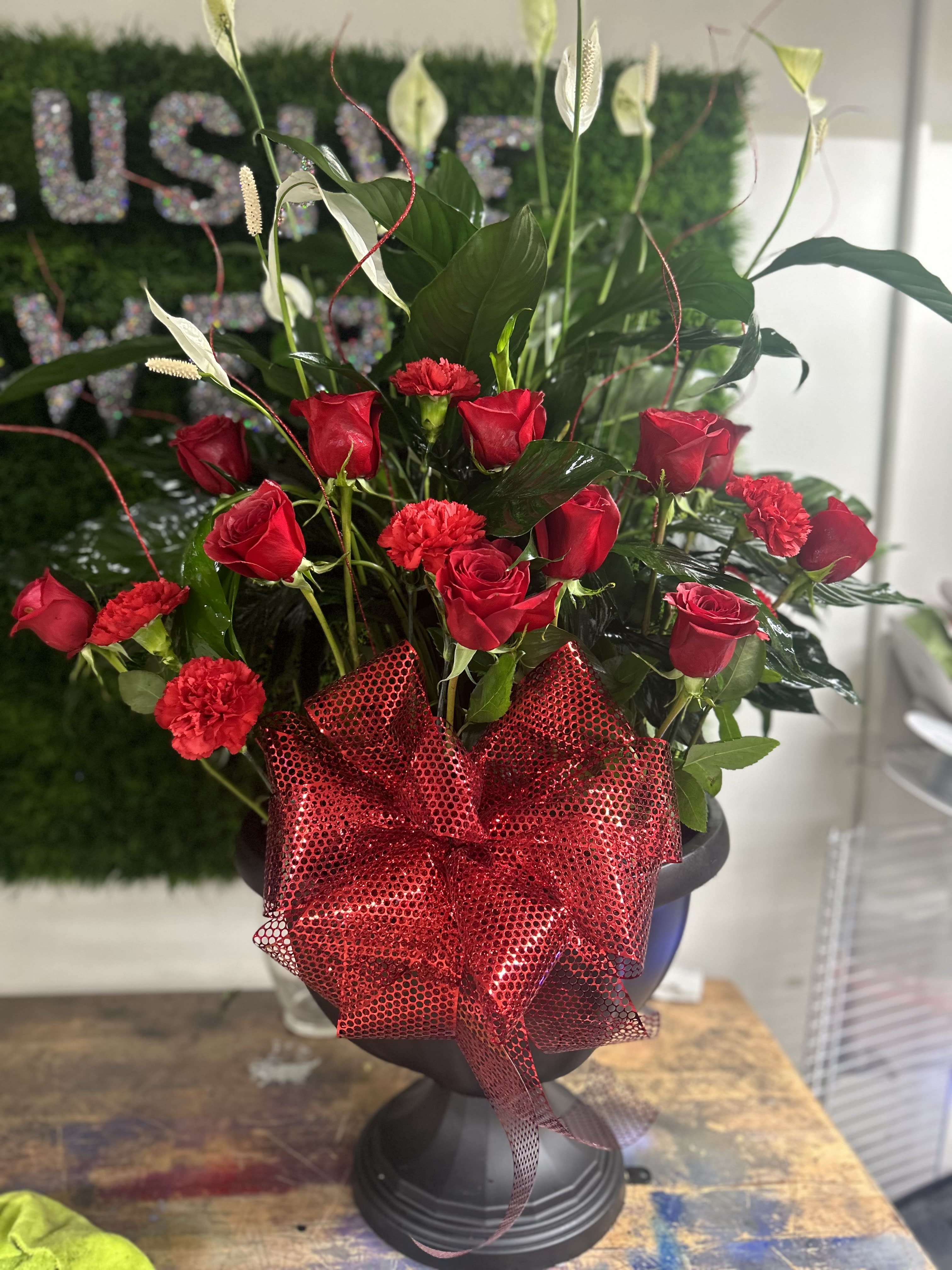 Funeral arrangements all styles - Roses and mixed flowers