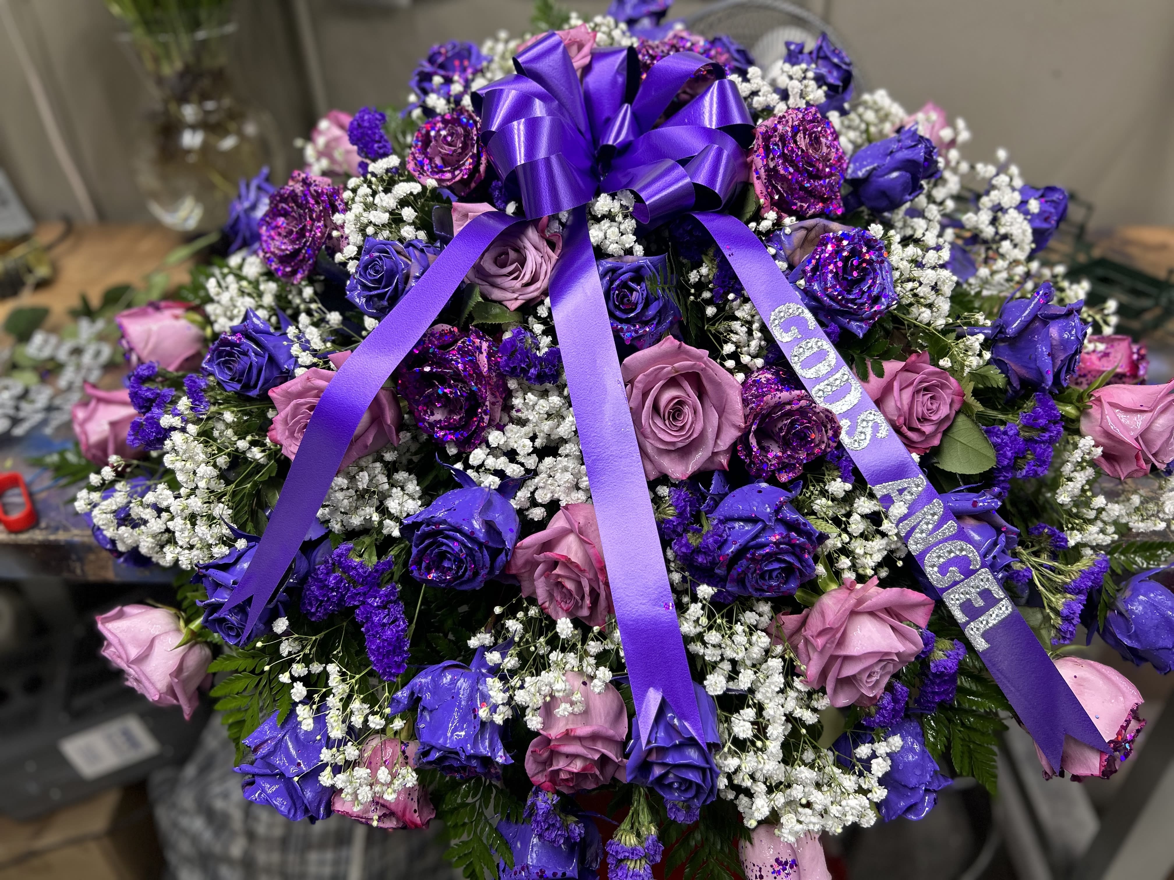 Purple and lavender casket spray - Purple and lavender rose casket spray