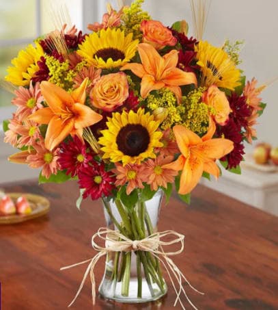 Fields Of Europe Autumn - Inspired by the colorful charm of the European countryside, our best-selling autumn bouquet is gathered with fresh-picked flowers, revealing the rustic beauty of nature. Shades of golden yellow, rich red and pops of orange create a timeless gift for someone special to enjoy.
