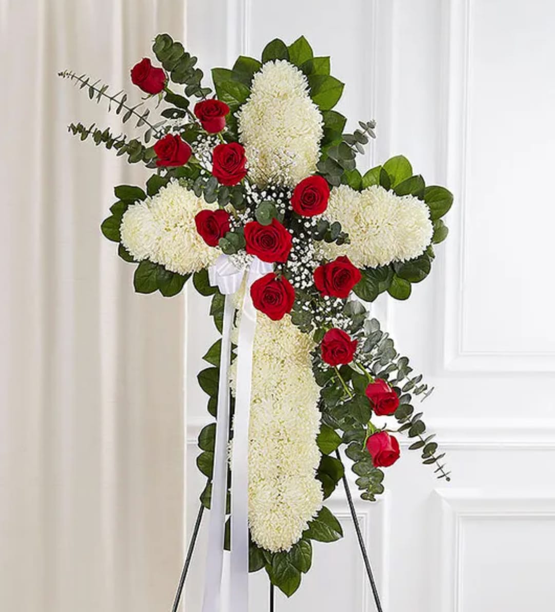 Cross-shaped floral standing spray with red roses and white chrysanthemums