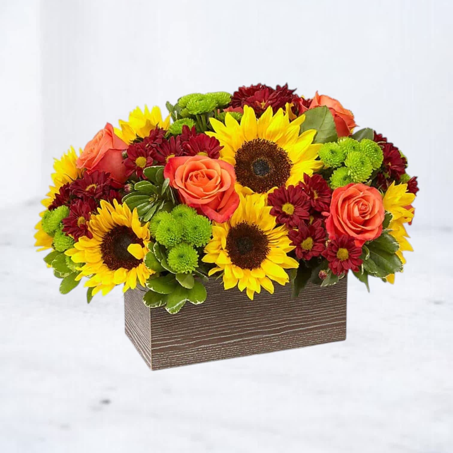 Sunflower and rose arrangement in a rectangular wooden box