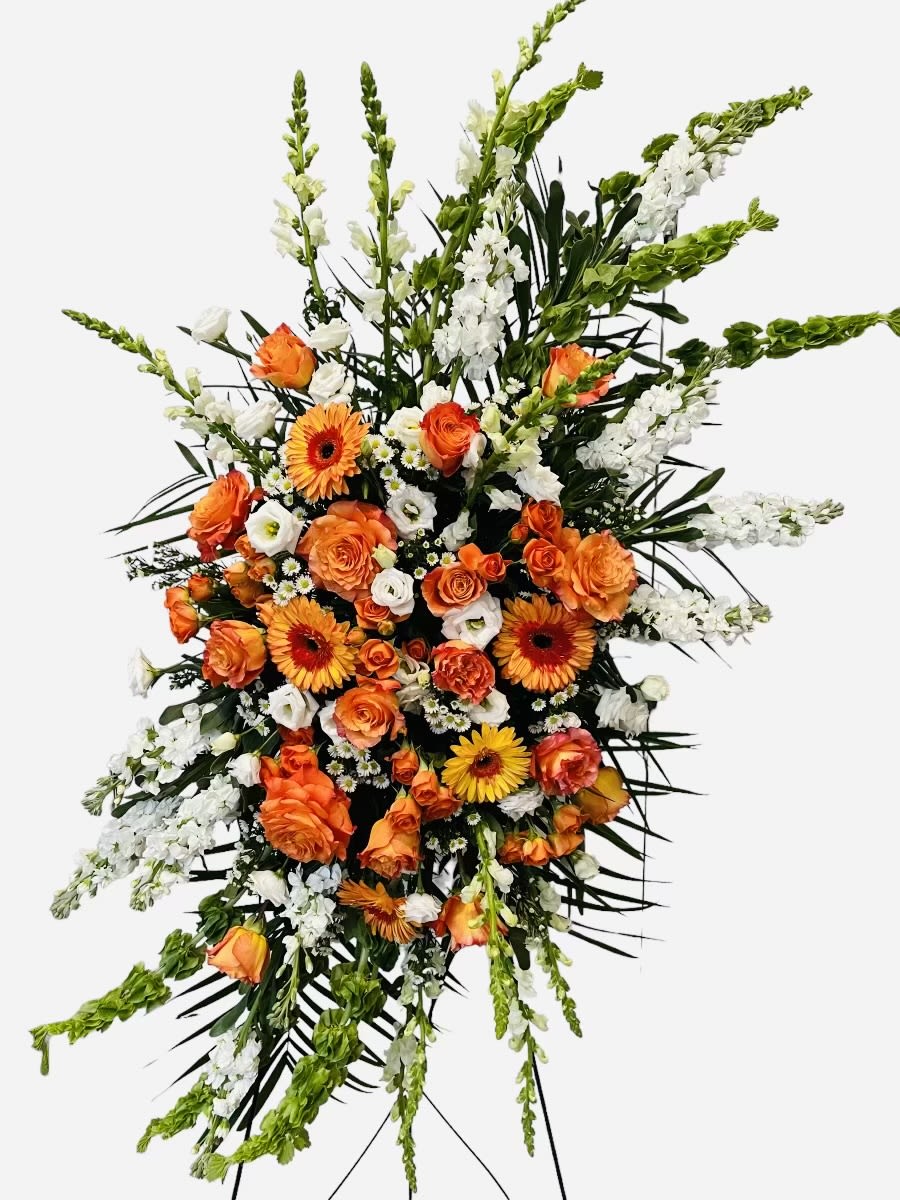 Large standing floral spray with orange and white flowers