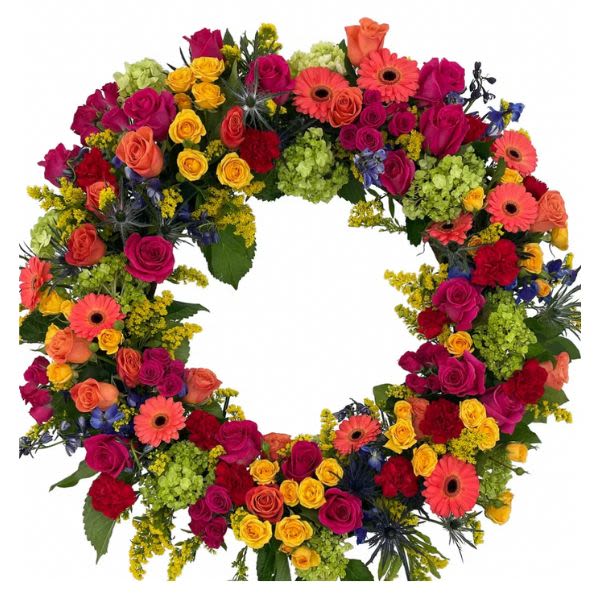 Colorful floral wreath with roses and gerbera daisies