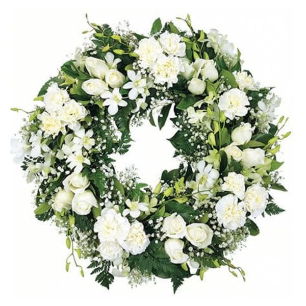 White floral wreath with roses and carnations