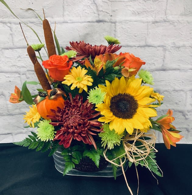 Designers Choice Fall Arrangement - Let our designers create the perfect Fall arrangement. We just love creating designs just for you!  Your arrangement may come in a vase, basket or container.