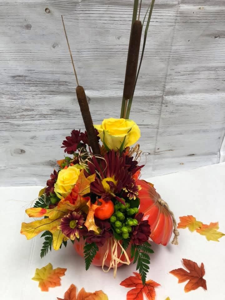Fall Pumpkin - Our fall pumpkins are back!!! Get yours with an assortment of flowers and colors. Leave it up to our designers to create the perfect pumpkin centerpiece or stunning arrangement for you! 