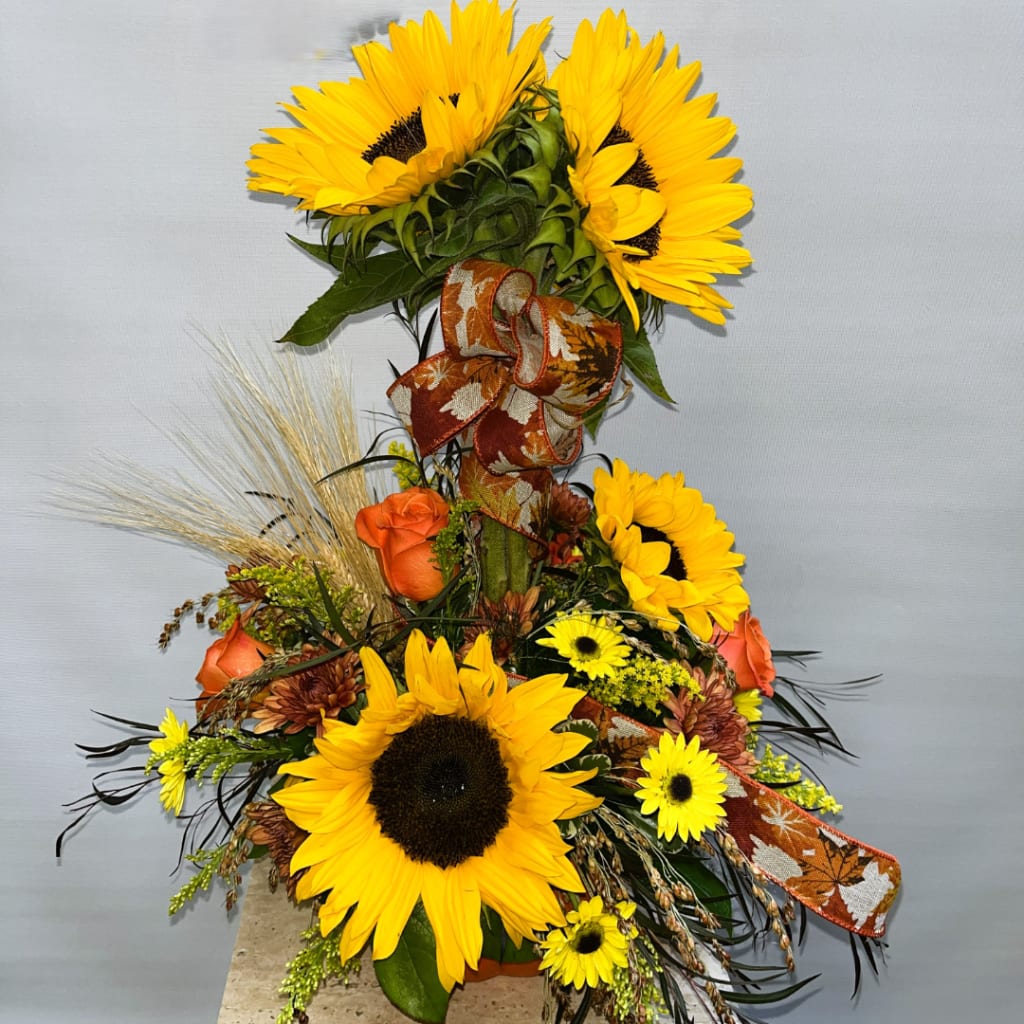 Sunflower and orange rose arrangement with autumn ribbon