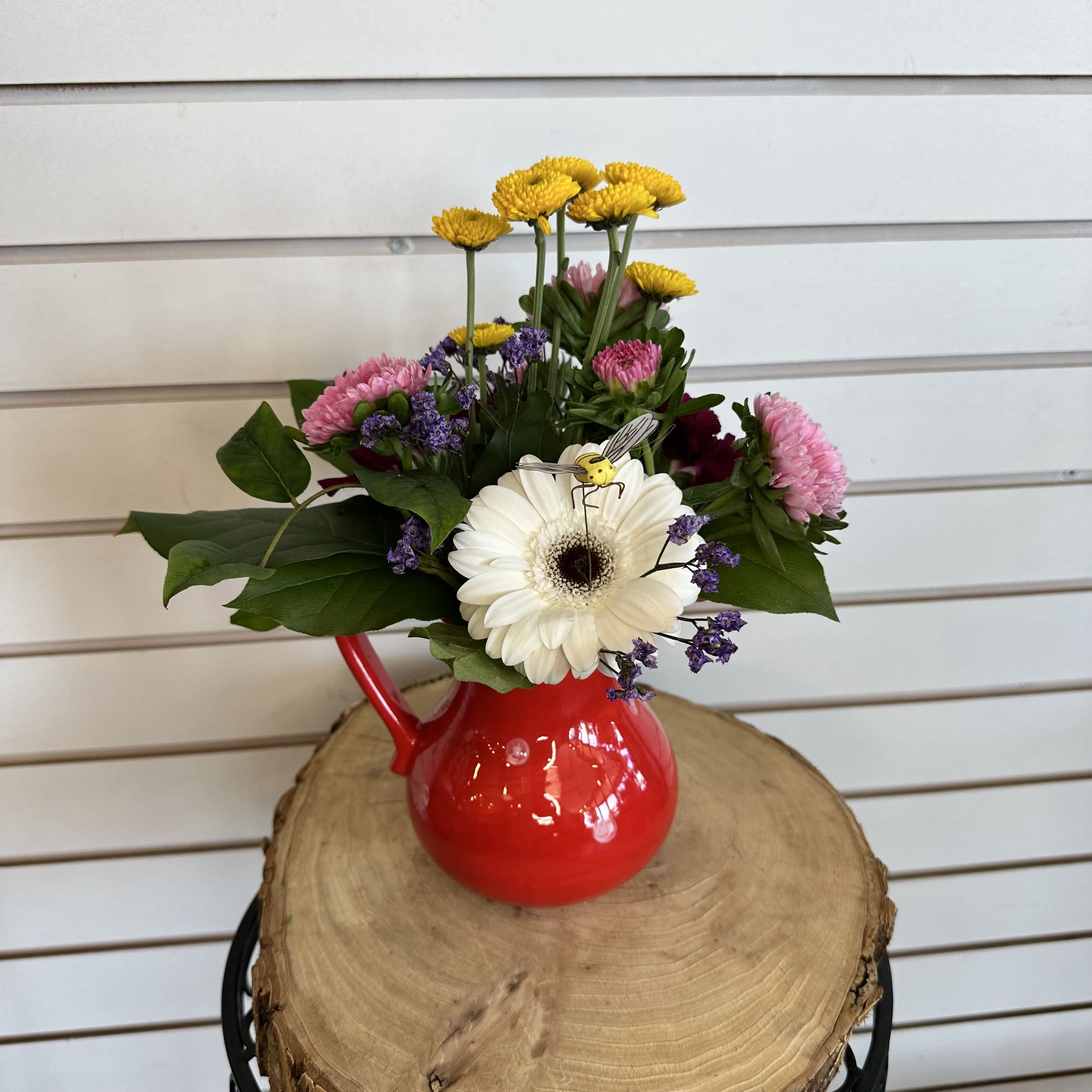 Bee-u-ti-ful Pitcher - An adorable ceramic pitcher full of fresh blooms, topped off with a fake bee.   ***Color of pitcher and flowers may vary from what is pictured
