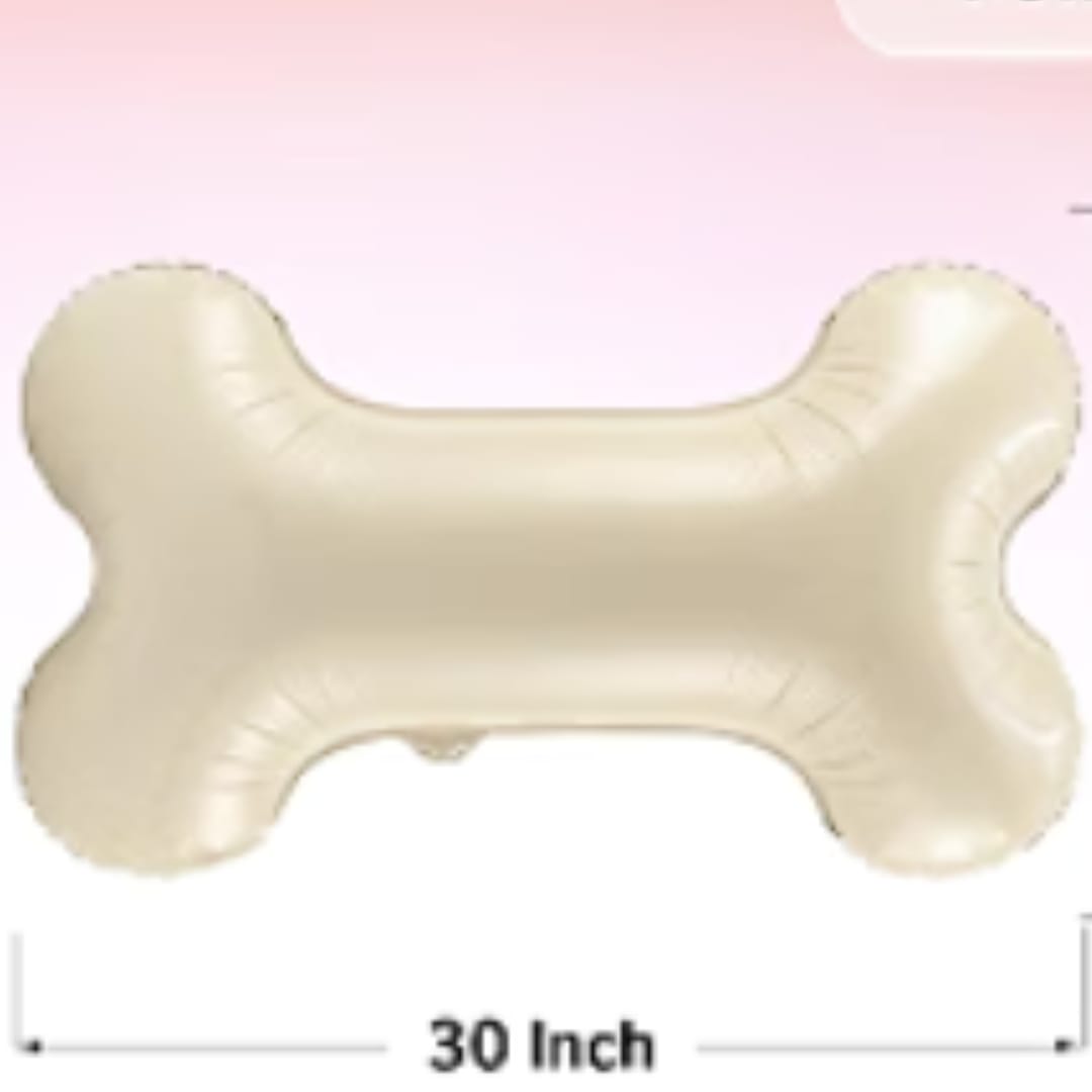 Cream bone-shaped balloon on a pink background with 30 inch text