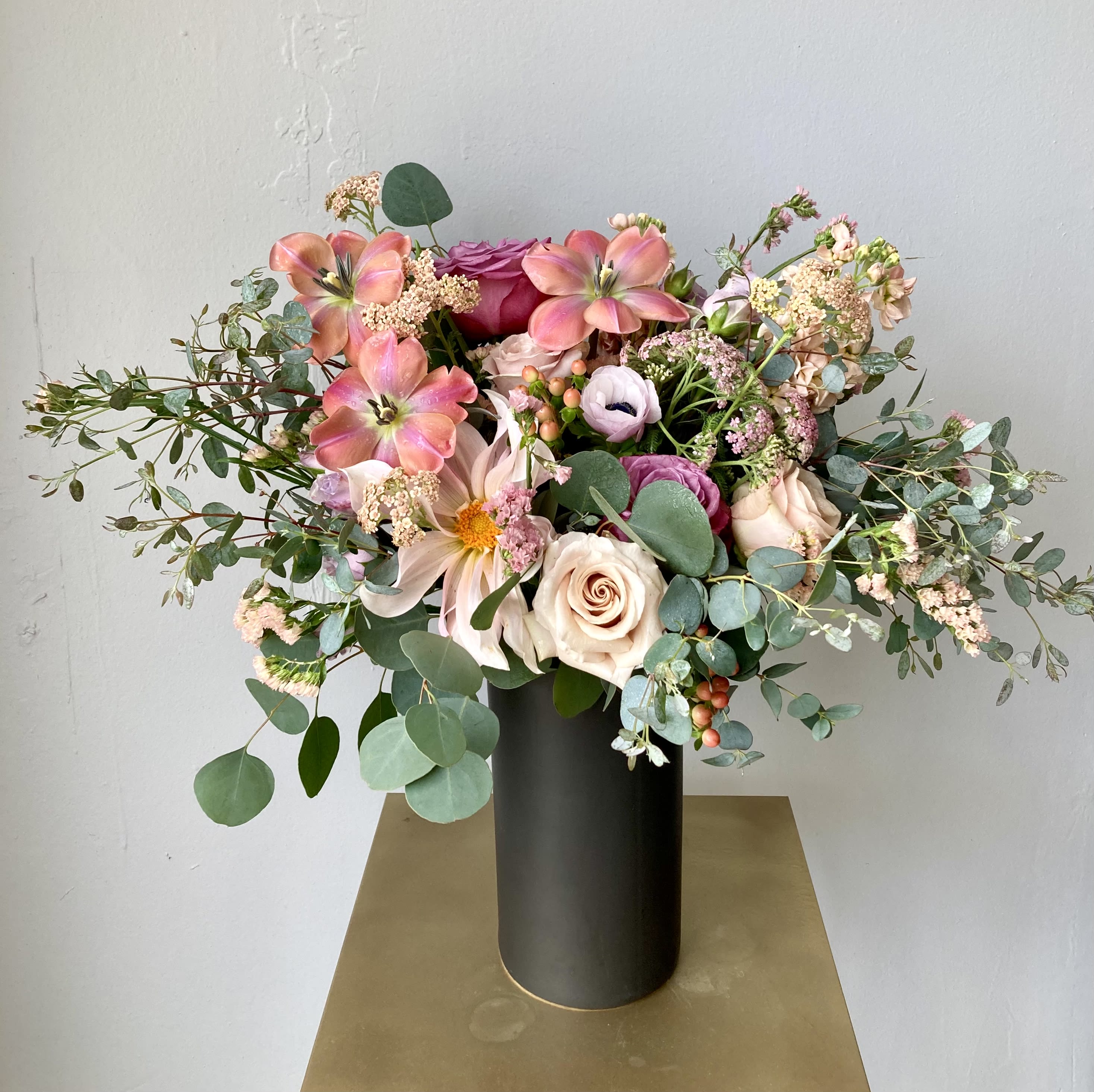 Pastel Palette - This lush garden mix comes in a black matte vase for a nice contrast of soft and ethereal with sleek and modern. Truly stunning!