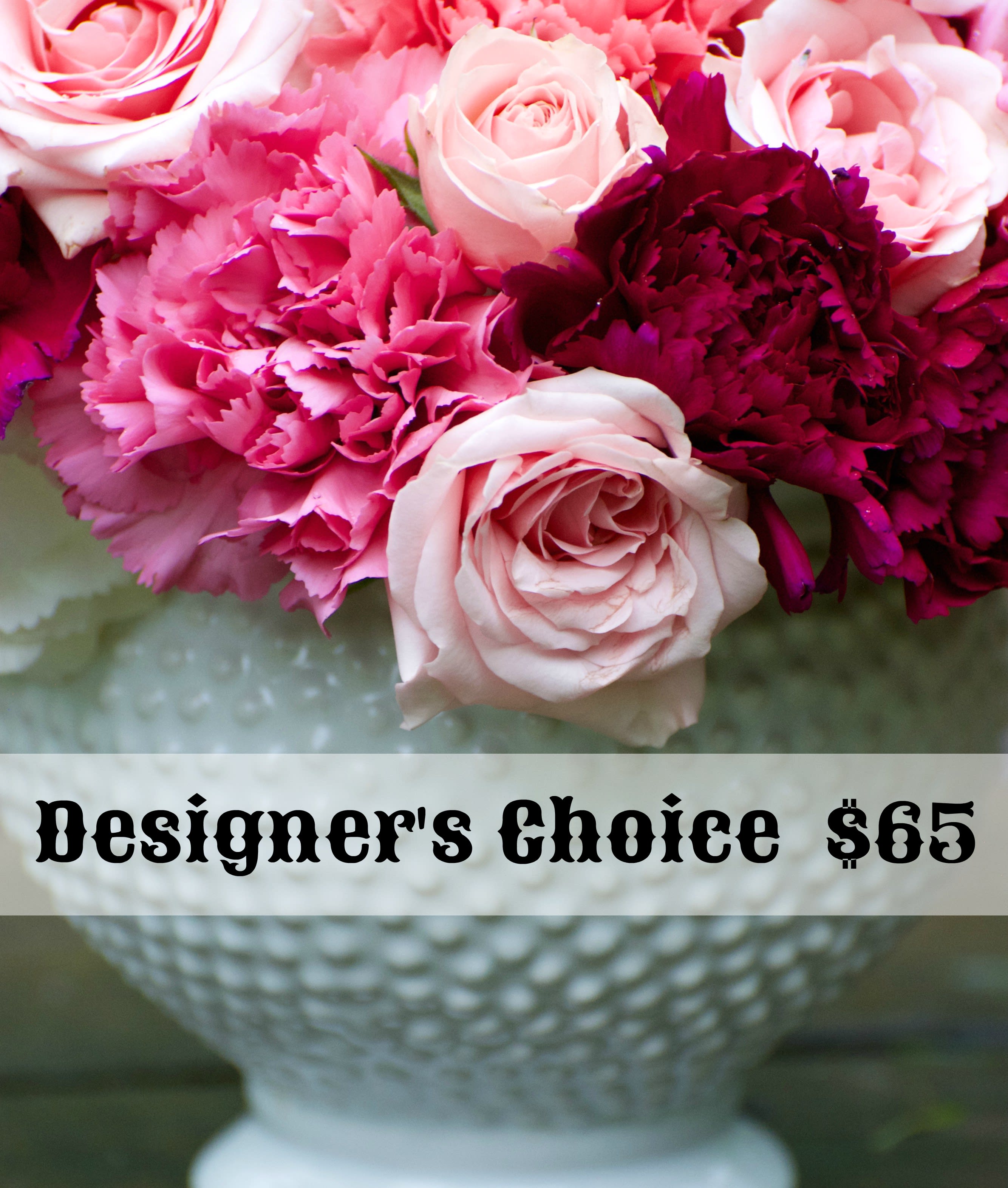 Pink and white roses with carnations in a white vase