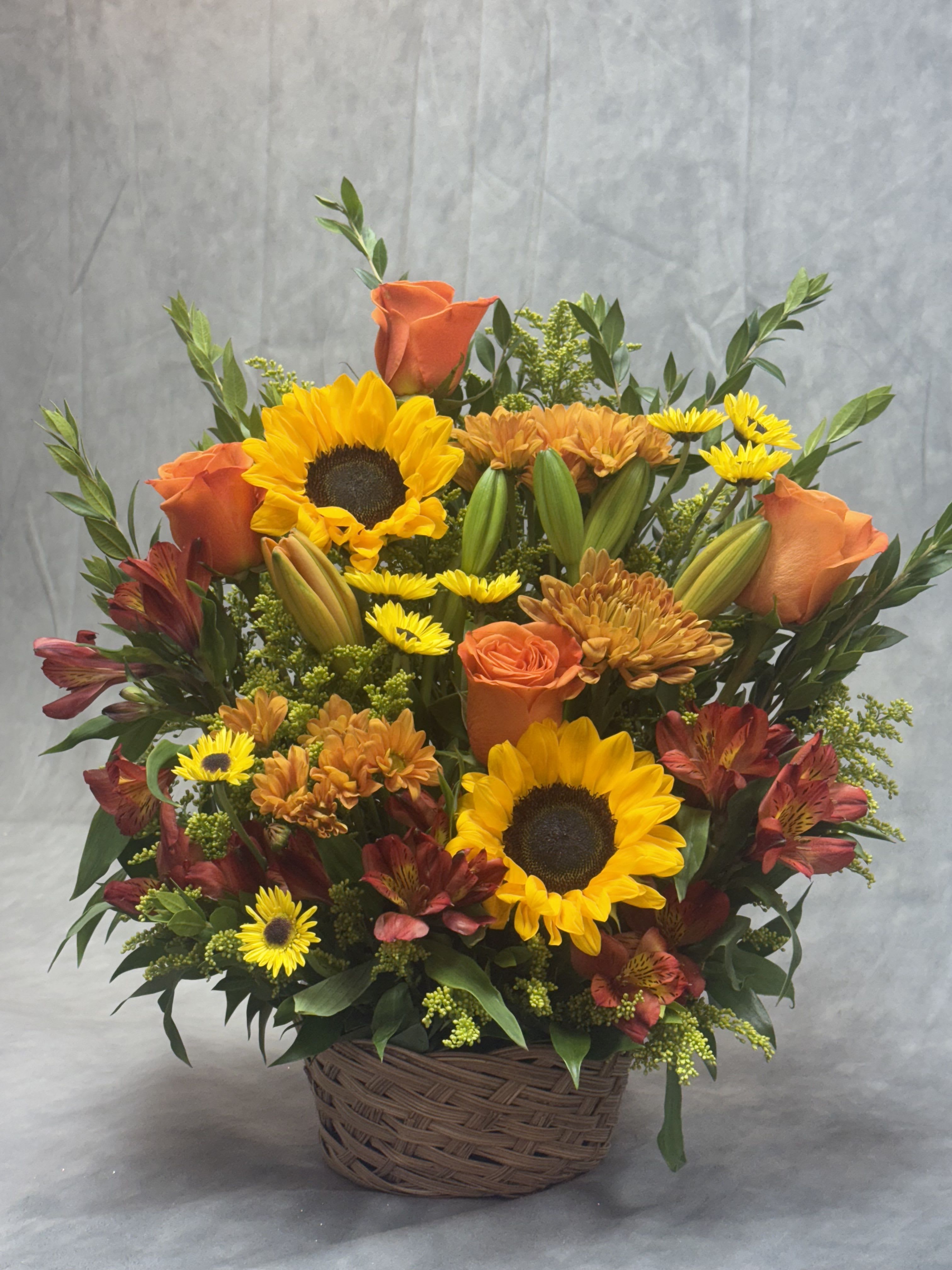 The Fall Basket  - Embrace the beauty of autumn with our exquisite fall basket arrangements! Handcrafted with vibrant hues of fall colors, our arrangements capture the essence of the season. Perfect Surprise to brighten their day! 