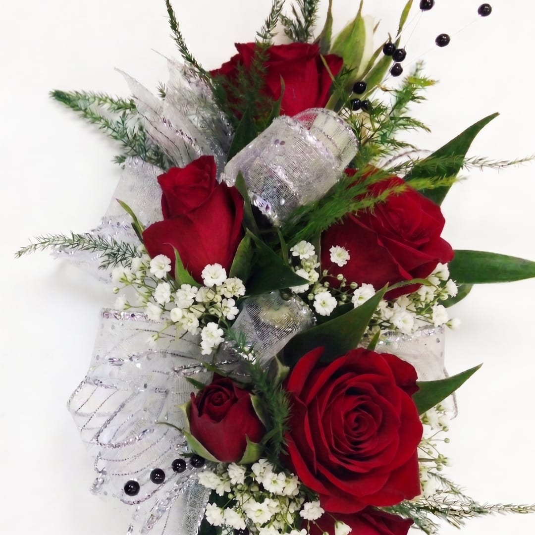 Bouquet of red roses with white filler flowers and silver ribbon