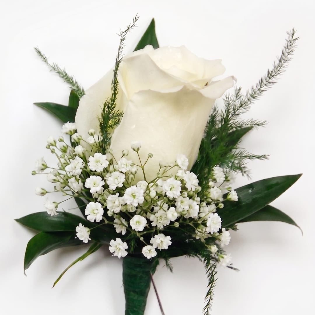 White rose boutonniere with baby's breath and greenery