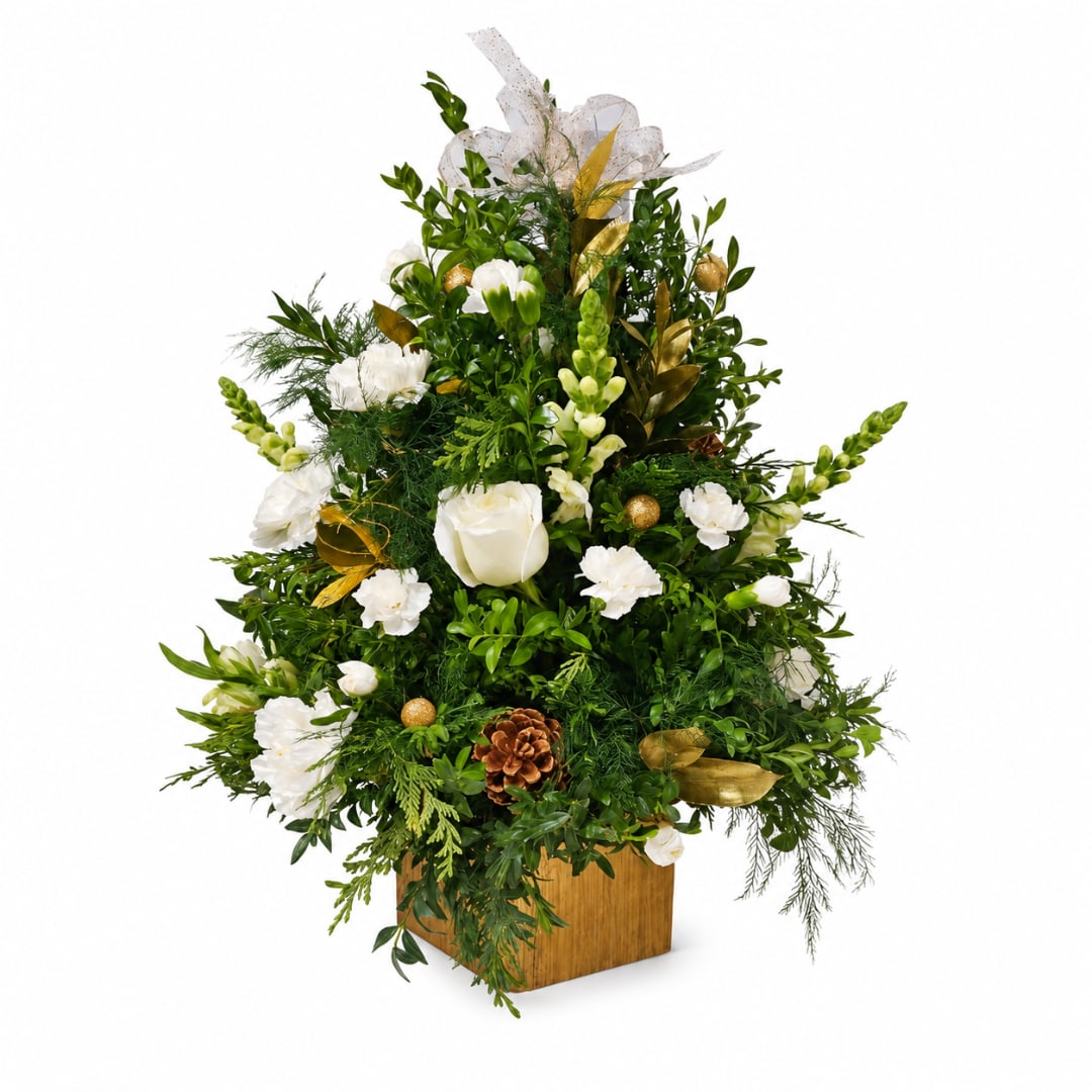 White floral arrangement with greenery in a wooden container