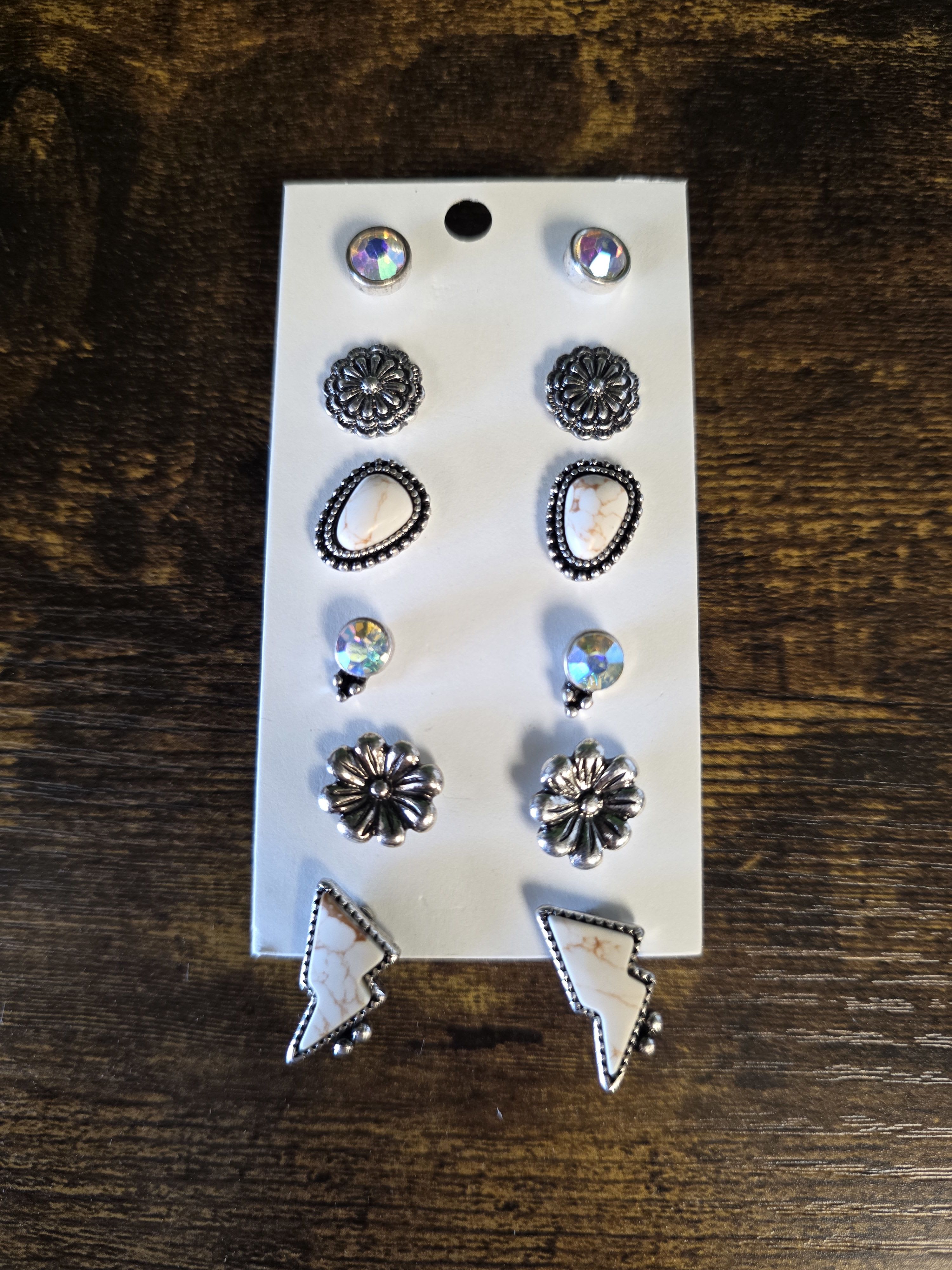 Card of assorted silver-tone stud earrings with faux stone accents