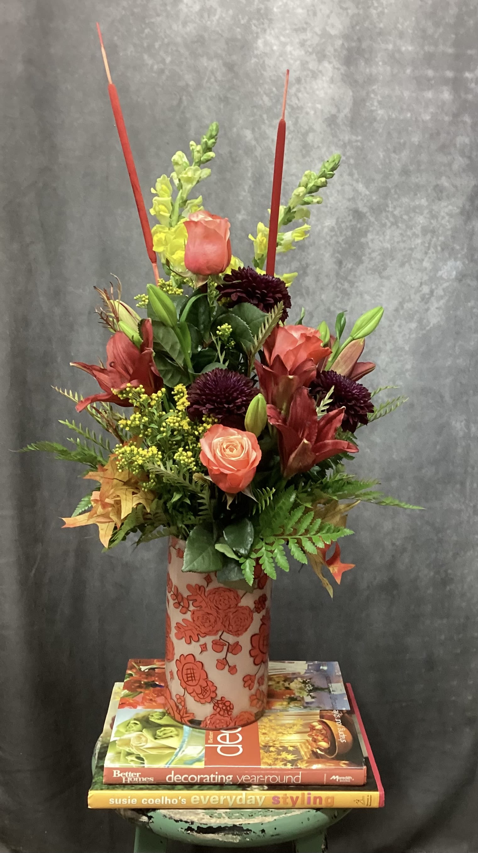 Autumn skies - Fall vase arrangement with warm colors.