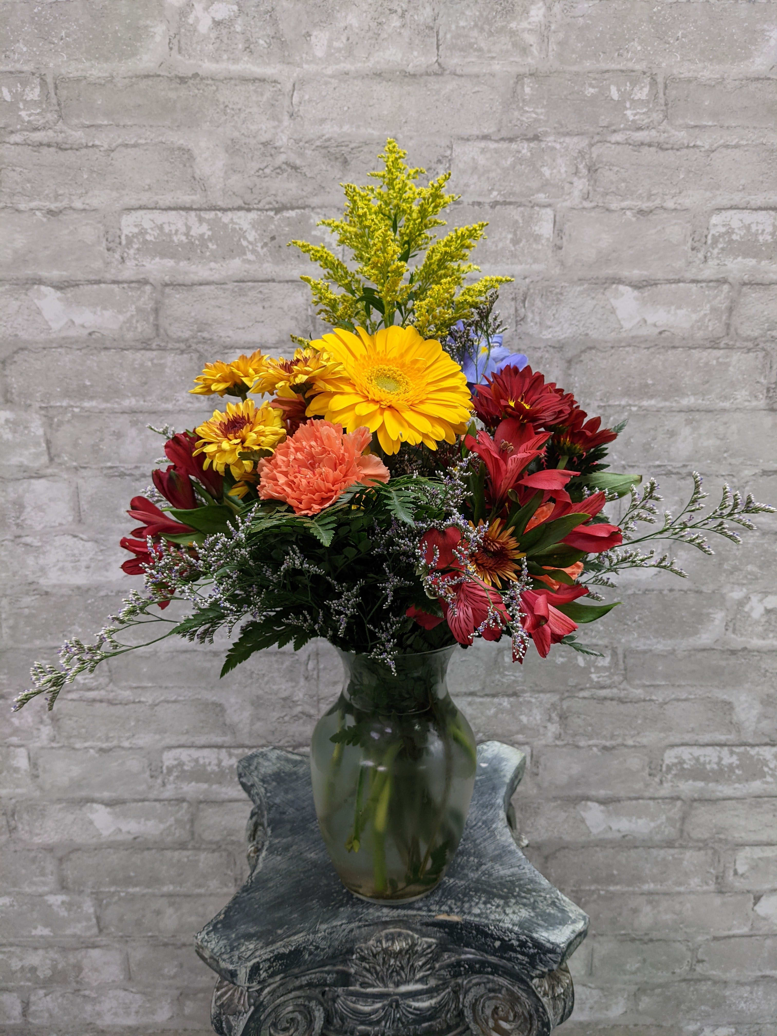 Your Special Fall FG206F - Delightful petite vase arrangement of gerber daisy, carnations and alstroemeria. This design would be ideal for an end table or work desk.  Approximately 22" H and 14 1/2" W.