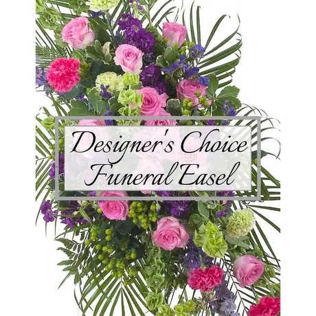 Funeral easel spray with pink roses, purple flowers, and greenery