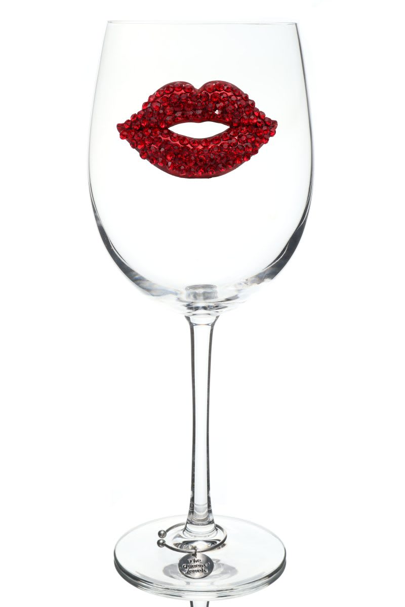 Red Lips Jeweled Glassware - There’s something about drinking a glass of fine wine with some lipstick – it’s the imprint of your lips that show the true character of someone who knows and loves their wine! Our new red lips jeweled wine glass can serve as the perfect gift for the wine lover in your life. This stylish wine glass features a pair of jeweled lips attached right to the face of it, complete with rhinestones and colorful stones that evoke.