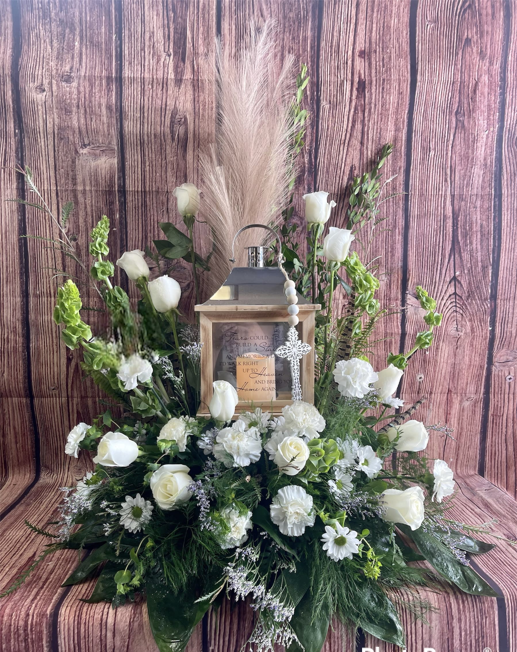 Memorial Lantern floral tribute - A Memorial lantern is a beautiful way to honor and remember loved ones who have passed.   “If tears could build a stairway, and memories a lane, I’d walk right up to heaven and bring you home again”