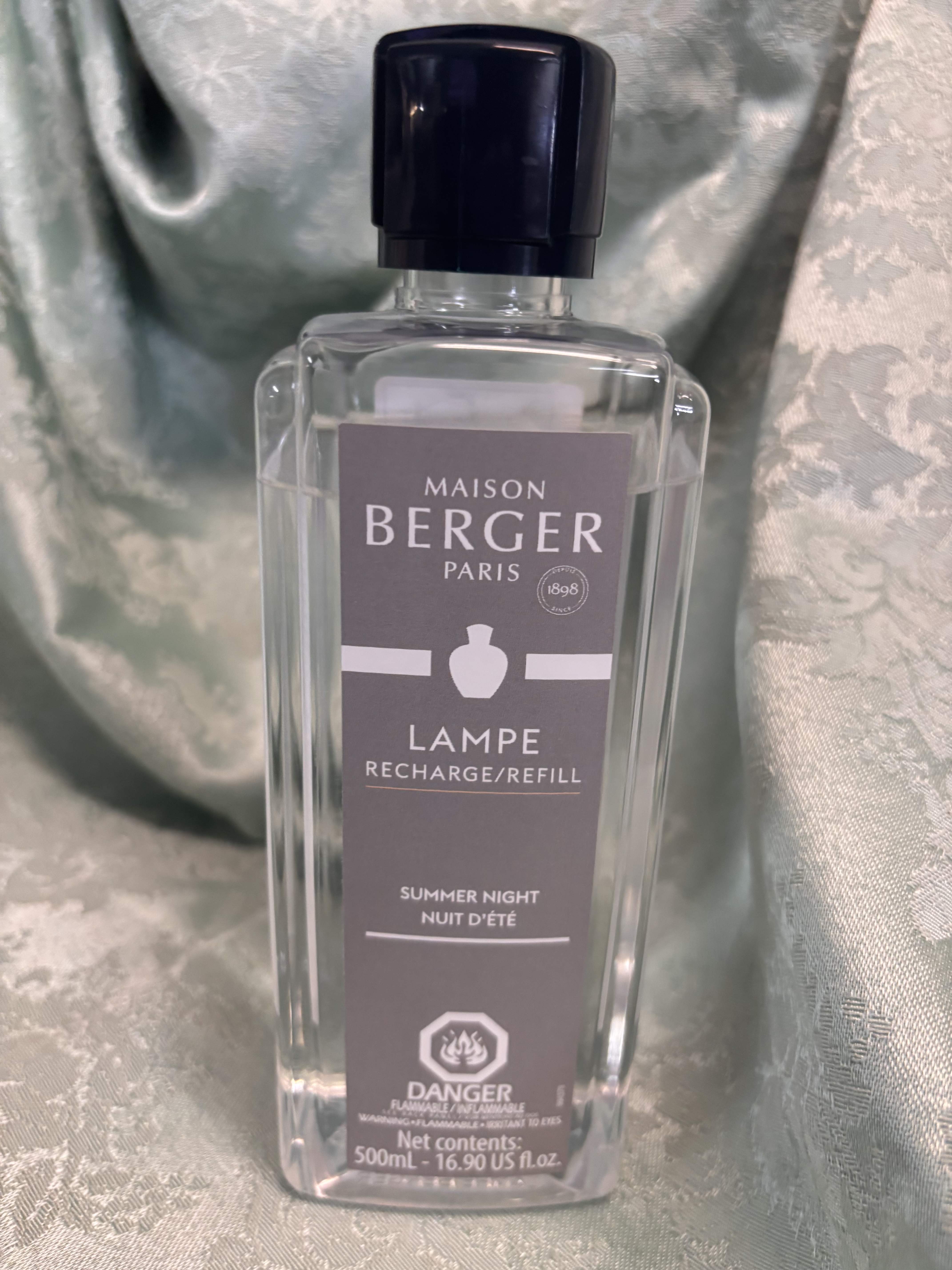 Clear refill bottle with black cap labeled Maison Berger Paris.